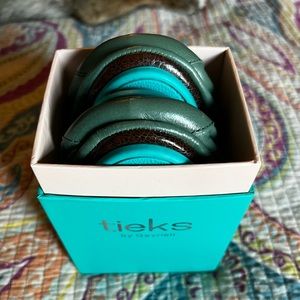 Size 9 Pacific Green Tieks.  Never worn.  NIB.